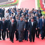 بوتين و شي جين بينغ وكيم لدى وصولهم إلى ميدان تيانانمن لحضور العرض العسكري (أ ف ب)