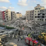 فرق الإنقاذ في موقع غارة إسرائيلية جنوب لبنان (أ ف ب)