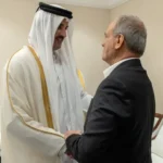 أمير قطر والرئيس الإيراني (أ ف ب)