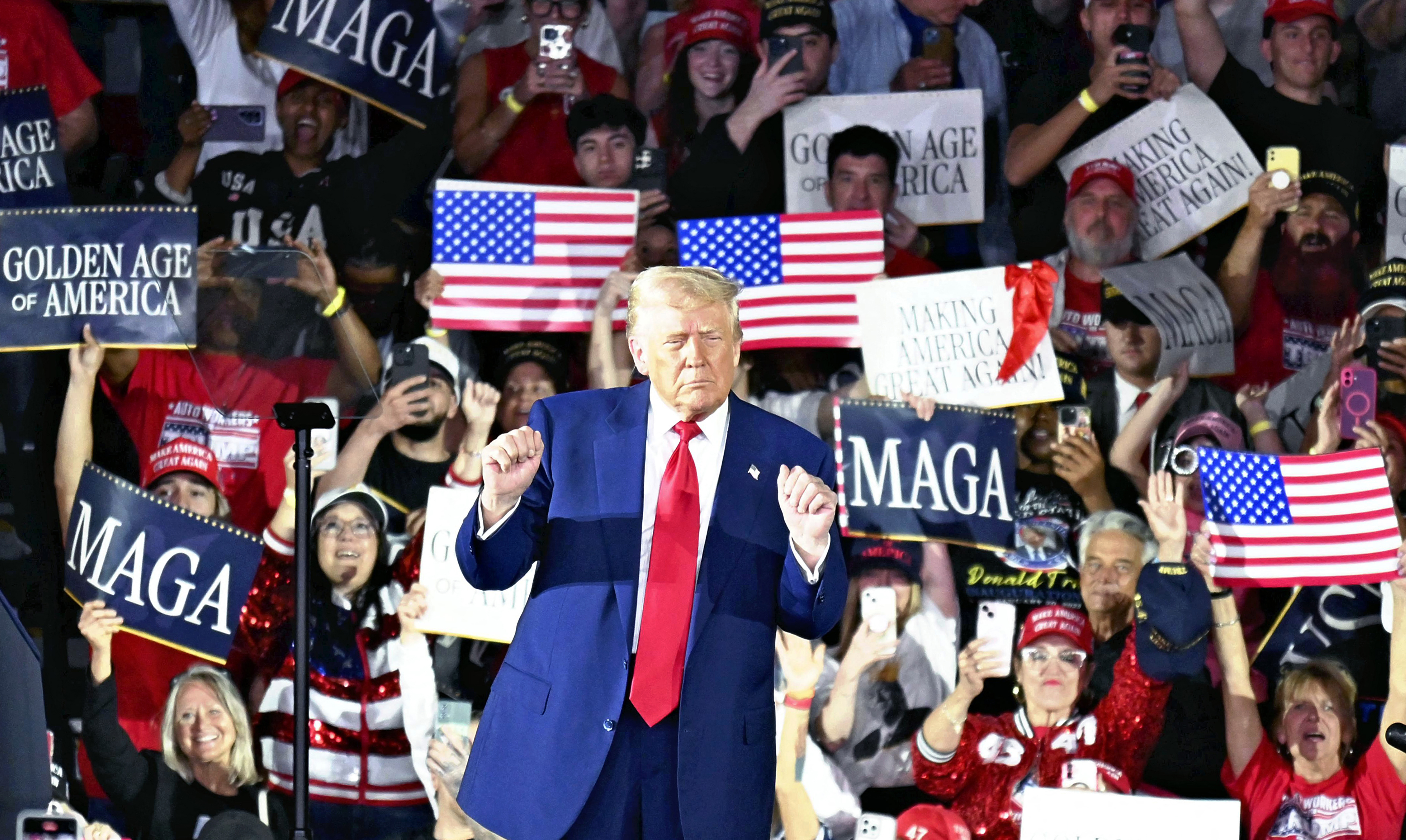 U.S. President Donald Trump appears during a rally at Warren, suburb of Detroit, Michigan, United States of America.AFP