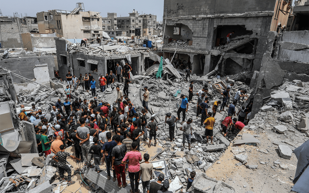Gaza residents search for the missing beneath the rubble after Israeli attack