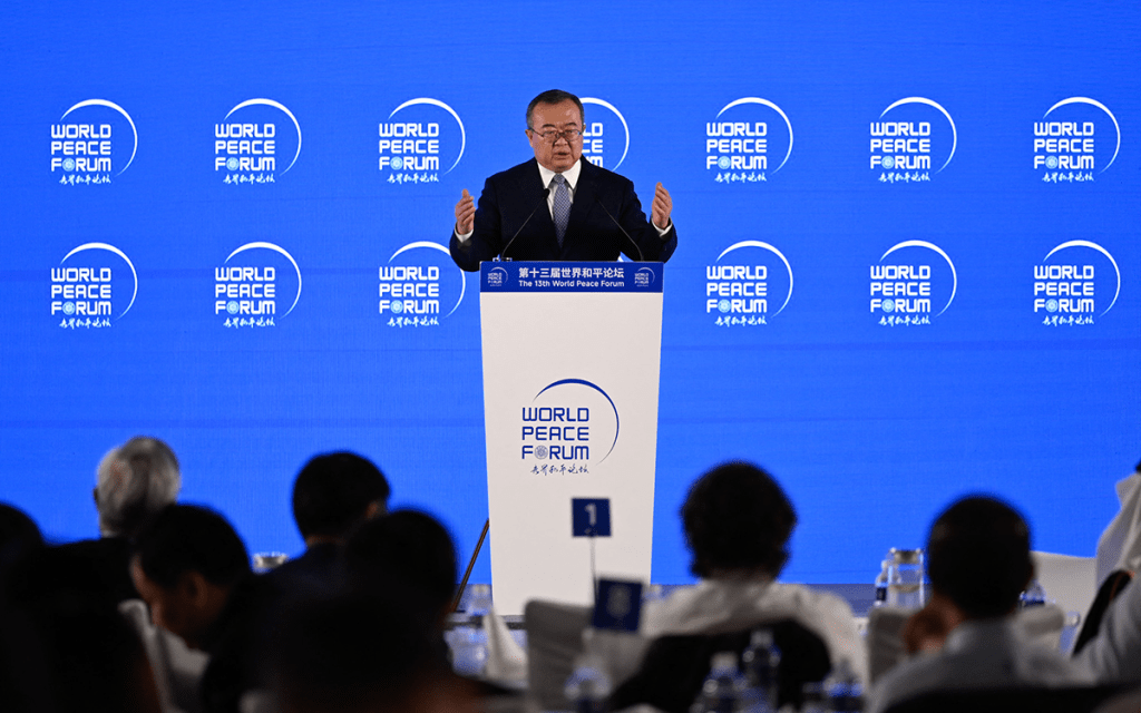 Liu Jianchao speaking at the World Peace Forum in Beijing. AFP