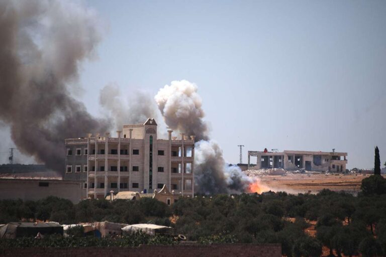 Plumes of smoke rise during clashes in the vicinity of Sweida province earlier on July 24, 2025. AFP