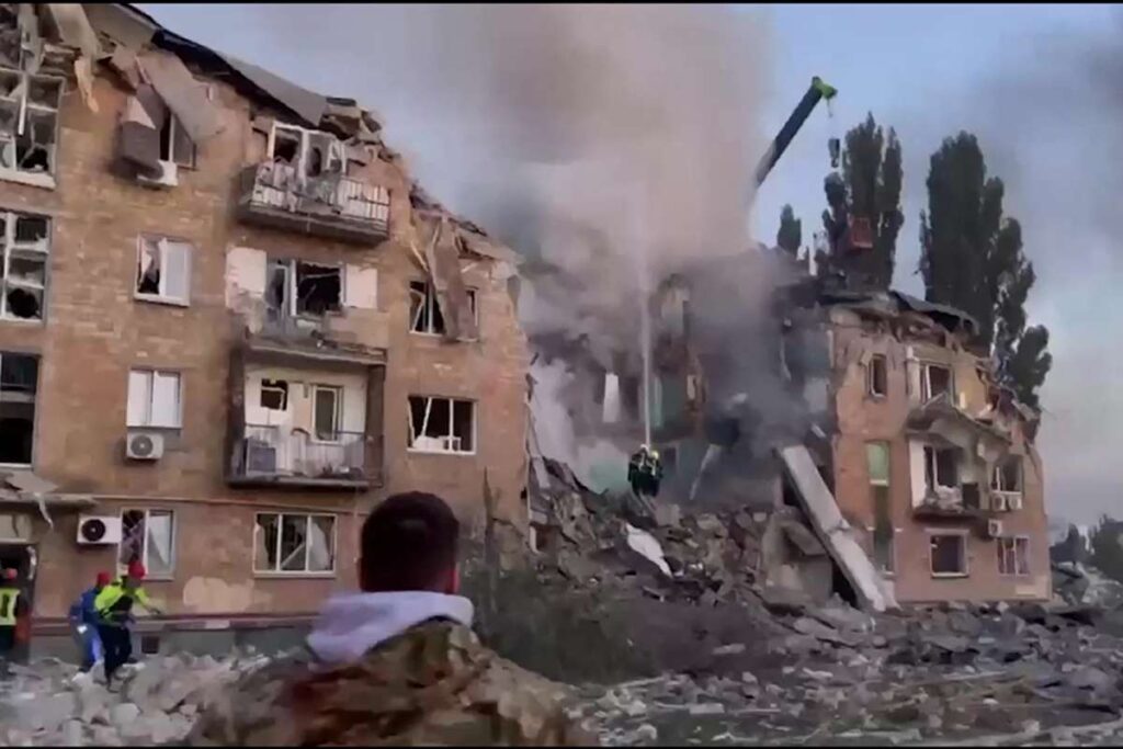 A screen grab showing rescuers working on a damaged building following a Russian missile strike in Kyiv. AFP