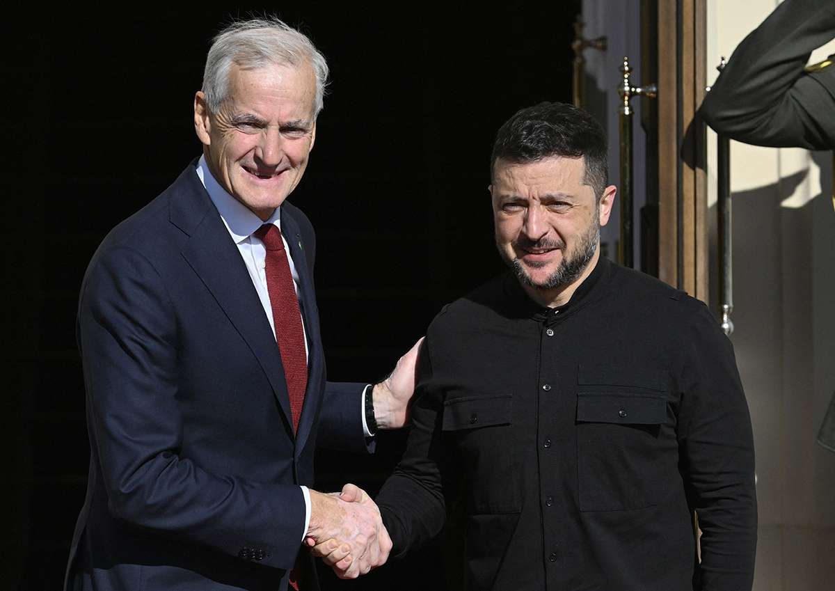 Prime Minister of Norway Jonas Gahr Store shakes hands with Ukrainian President Volodymyr Zelensky in Kyiv. AFP