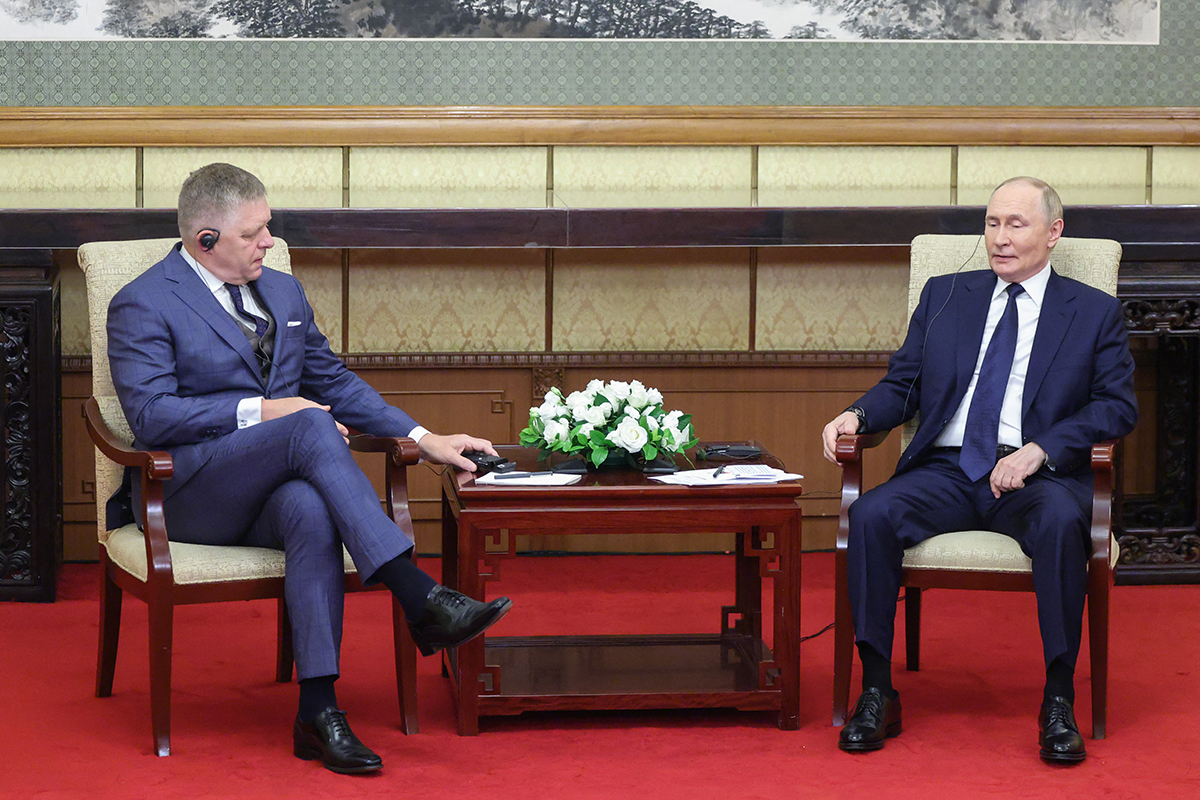 Russian President Vladimir Putin meets with Slovakian Prime Minister Robert Fico at the Diaoyutai State Guesthouse in Beijing. AFP