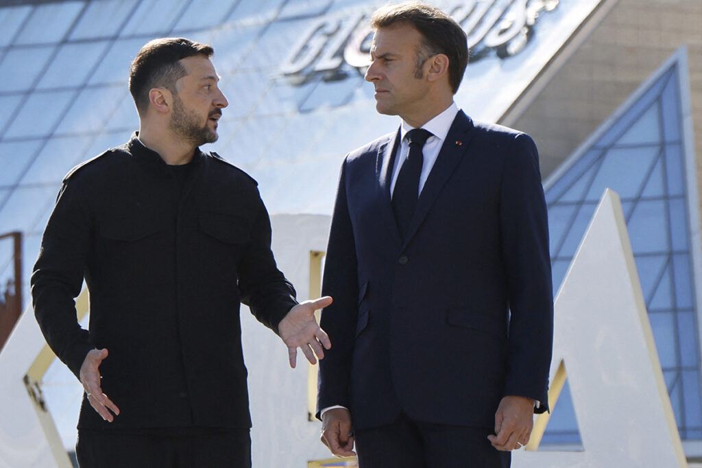 Volodymyr Zelensky speaks with Emmanuel Macron in Kyiv this May. (AFP)