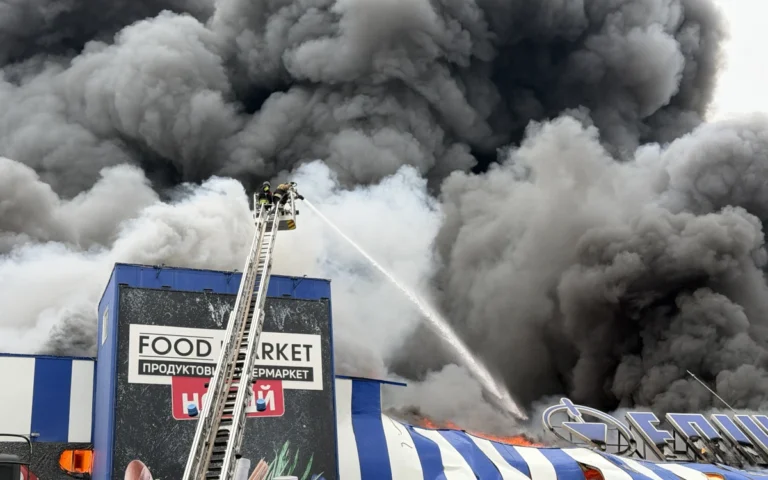 Part of the firefighting operation at a shopping center after an airstrike on Zaporizhzhia (AFP)