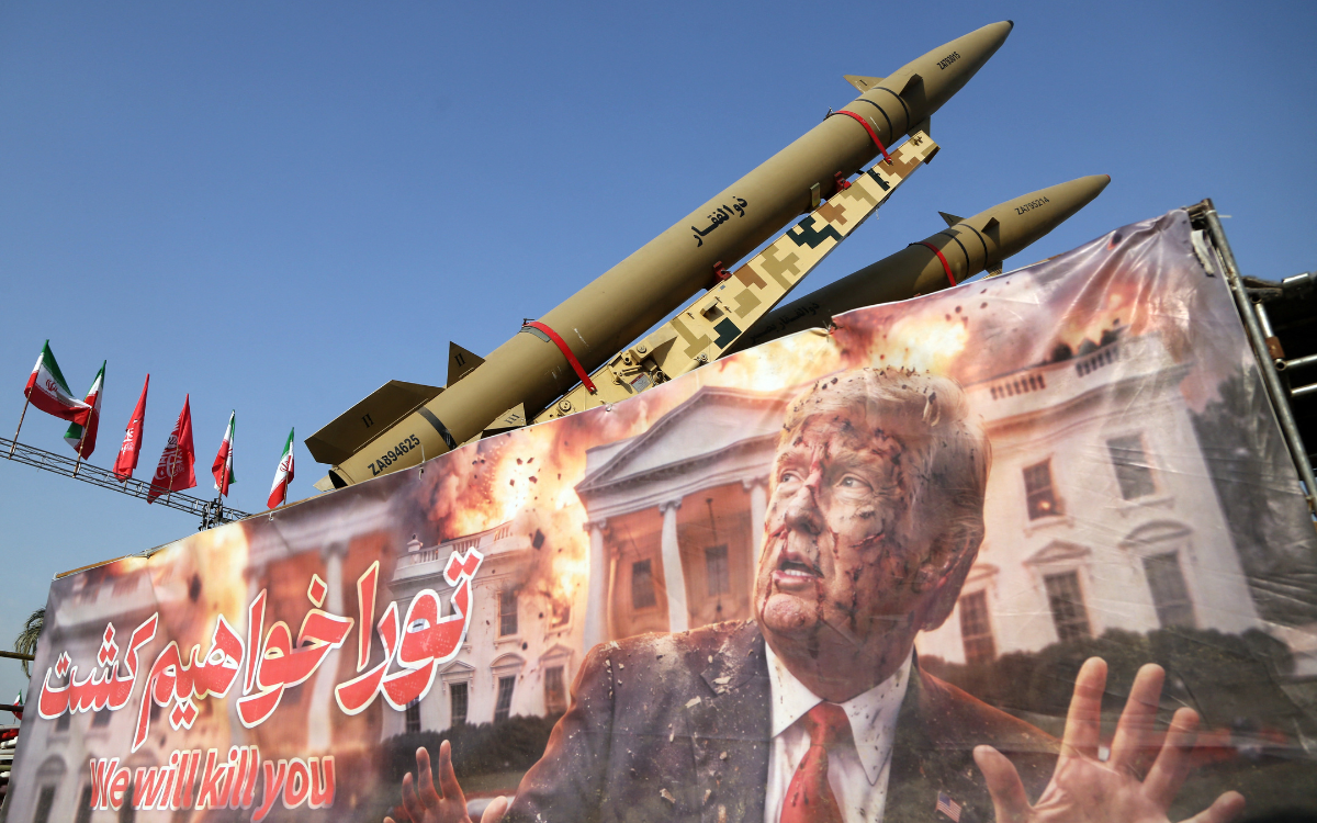 A banner depicting U.S. President Donald Trump and bearing messages was displayed in front of the Zolfaghar and Zolghadr ballistic missiles exhibited at Azadi Square in Tehran, Iran's capital, on August 2, 2026.