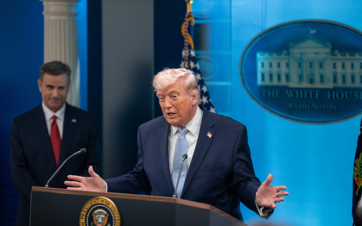 President Donald Trump speaks in the White House press briefing room about the rescue of downed American pilots in Iran on April 6, 2026. He is joined by CIA Director John Ratcliffe, U.S. Secretary of Defense Pete Hegseth, and Chairman of the Joint Chiefs of Staff Gen. Dan Caine. 