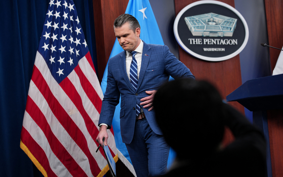 U.S. Secretary of War Pete Hegseth departs following a press briefing at the Pentagon on April 08, 2026 in Arlington, Virginia. It was announced that a temporary ceasefire has been reached between the U.S., Iran, and Israel, pausing attacks for about two weeks while Iran reopens the Strait of Hormuz and negotiations continue toward a longer-term agreement.